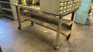 lot 259 image: Metal shop tablework bench on cast...