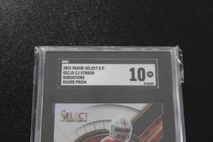 lot 13 image: 2022 Select Sensations Silver Prizm CJ Stroud Rookie Card SGC 10