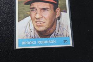 lot 43 image: 1964 Topps Brooks Robinson #230 In Person Autograph Damaged - See Description