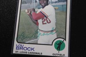 lot 57 image: 1973 Topps Lou Brock #320 In Person Autograph Damaged - See Description
