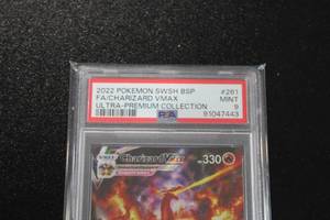 lot 65 image: Charizard VMAX Ultra Premium Collection #SWSH261 PSA 9