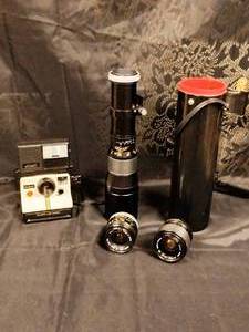 lot 52 image: Polaroid Land Camera with Removable Flash & 3 Camera Lenss