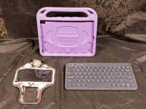 lot 53 image: IPad Case, Bluetooth Keyboard, and Workout PhoneCase