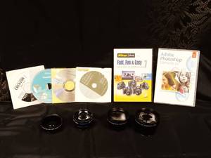 lot 61 image: 6 Photo Editing Software Discs and 4 Camera Lenss