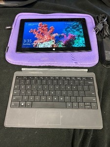 lot 80 image: Windowns Surface Pro (works) with Case and Charger