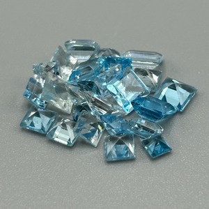 11.20 Carat Light to Medium Blue Topaz Square Emerald Cut - Assorted Lot of Loose Stones