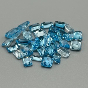 29.56 Carat Blue Topaz Rectangular Emerald Cut - Various Color & Size Assorted Lot of Loose Stones