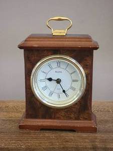 lot 57 image: Vintage Bulova Wood Mantel Clock