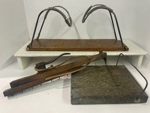 lot 131 image: Antique Soapstone Footwarmer, Rug Stretcher and Mystery Primitive Items