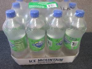 lot 586 image: 12- 33.8 oz Ice Mountain Zesty Lime...