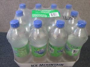 lot 587 image: 12- 33.8 oz Ice Mountain Zesty Lime...