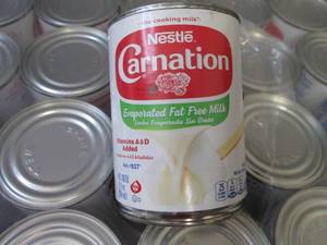 lot 588 image: 24- 12 oz Carnation Evaporated Fat ...
