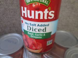 lot 590 image: 12- 14.5 oz Hunts No Salt Diced Bas...