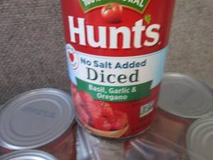lot 591 image: 12- 14.5 oz Hunts No Salt Diced Bas...