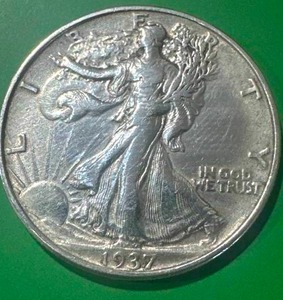 lot 14 image: 1937 Walking Half Dollar