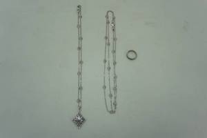 lot 1 image: Sterling silver necklaces and ring