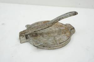 lot 82 image: Cast iron tortilla iron