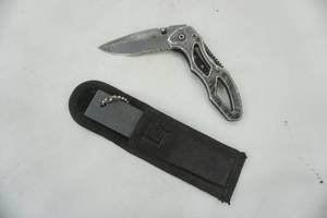 lot 97 image: Guidesman hunting knife and honing stone