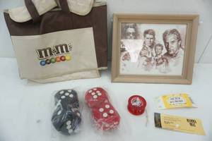 lot 101 image: Movie star art, fuzzy dice, M&Ms and old ticket stubs
