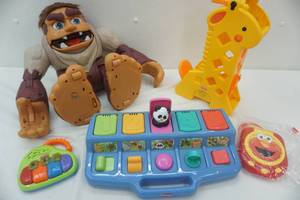 lot 104 image: Fisher Price, Playskool and Sesame Street toys