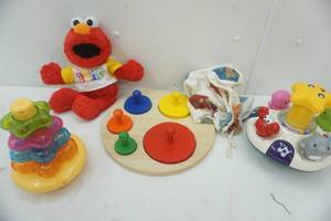 lot 105 image: Vintage Elmo, V tech and other toys