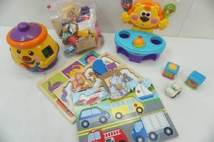 lot 106 image: Vintage toys, Fisher Price and wooden puzzles