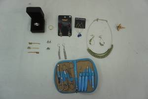 lot 123 image: Jewelry Lot, stainless steel mens ring, Avon ring, earrings and other