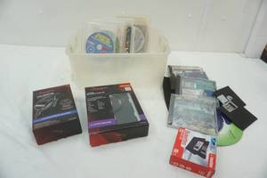lot 168 image: Laptop car adapters, appear new and business CDs