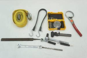 lot 172 image: Tool lot and strap