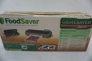 lot 202 image: Food saver, Outdoorsman vacuum sealing system