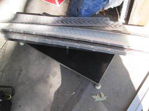 Stack of vented gutter guards plus ...