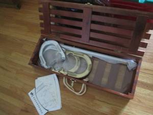 Metal horseshoe set with wooden car...