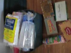 Covered tote overflowing with a var...
