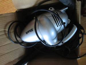 Shark hand held mini-vacuum and acc...