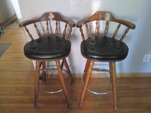 Pair of low-back swiveling padded b...