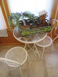 Metal outdoor bistro table and chai...