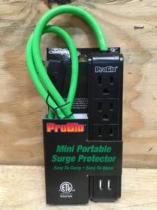 lot 57 image: ProGlo Mini Portable Surge Protector