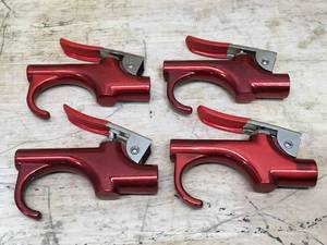 lot 130 image: Set of 4 Red Aluminum Trigger Locks