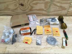lot 153 image: Assorted Industrial Tools and Parts Lot including Carbide Tools, Gauges, and Fittings