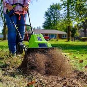 lot 7 image: 12 in. 9 Amp Electric Garden Tiller Cultivator    Customer Returns See Pictures