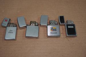 lot 220 image: 4 Zippo Lighters