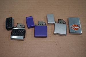lot 221 image: 4 Zippo Lighters