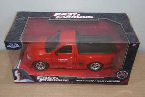lot 26 image: Jada Fast & Furious Brians Ford F-150 SVT Lightning Die Cast Model
