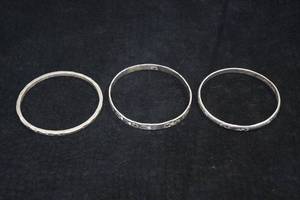 lot 106 image: 3 Sterling Silver Bangle Bracelets