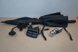 lot 186 image: Assorted Automotive -Phone Holder, White Light, Hitch Ball, Umbrella