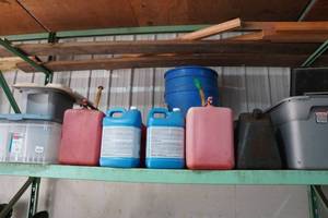 lot 387 image: Assorted Liquid Cans and Bins