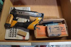 lot 411 image: Contents of Drawer - Bostitch Air Stapler and Staples