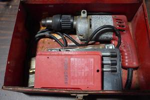 lot 448 image: Milwaukee 12 Corded Drill with Bits