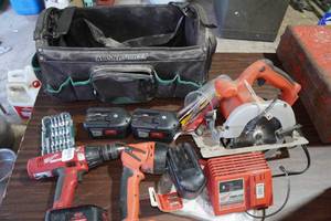 lot 446 image: Cordless Milwaukee Tools - Saw, Drill, Light