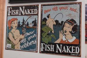 lot 104 image: Fish Naked Metal Signs